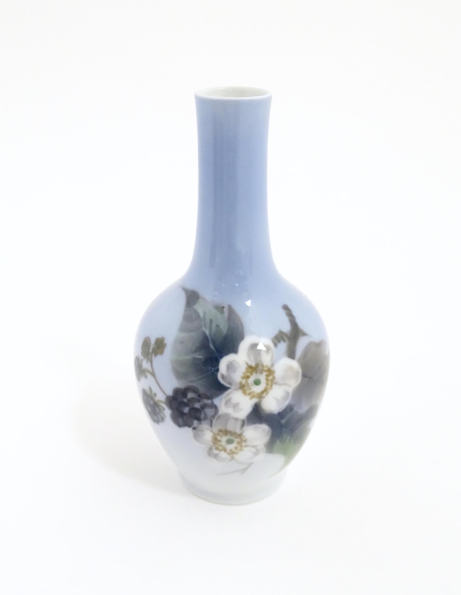 A Royal Copenhagen vase decorated with flowers and blackberries. Marked under 288 43A. Together with - Image 13 of 18