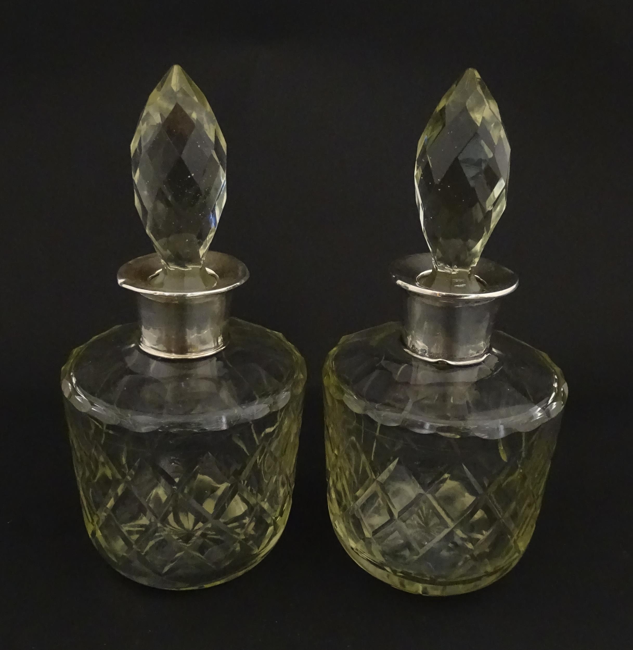 Two glass flasks formed as small cut glass decanters with Argentinian .925 silver mounts. Approx. 8" - Image 5 of 10