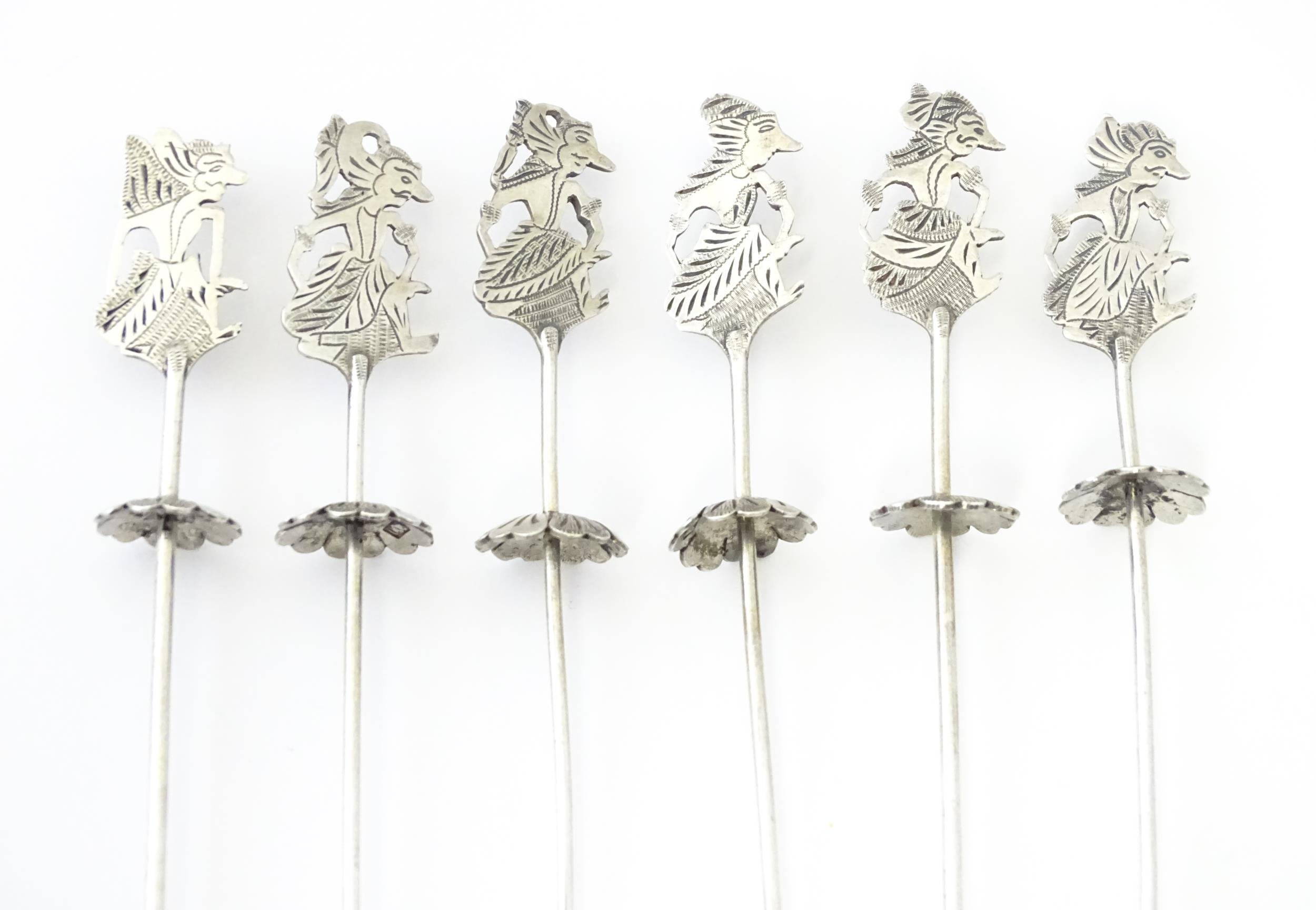A set of Continental .800 silver skewers / long cocktail sticks with figural finials. Approx 7" long - Image 6 of 6