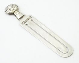 A silver bookmark with wheat sheaf detail, hallmarked Sheffield 1988, maker Hugh Crawshaw. Approx. 2