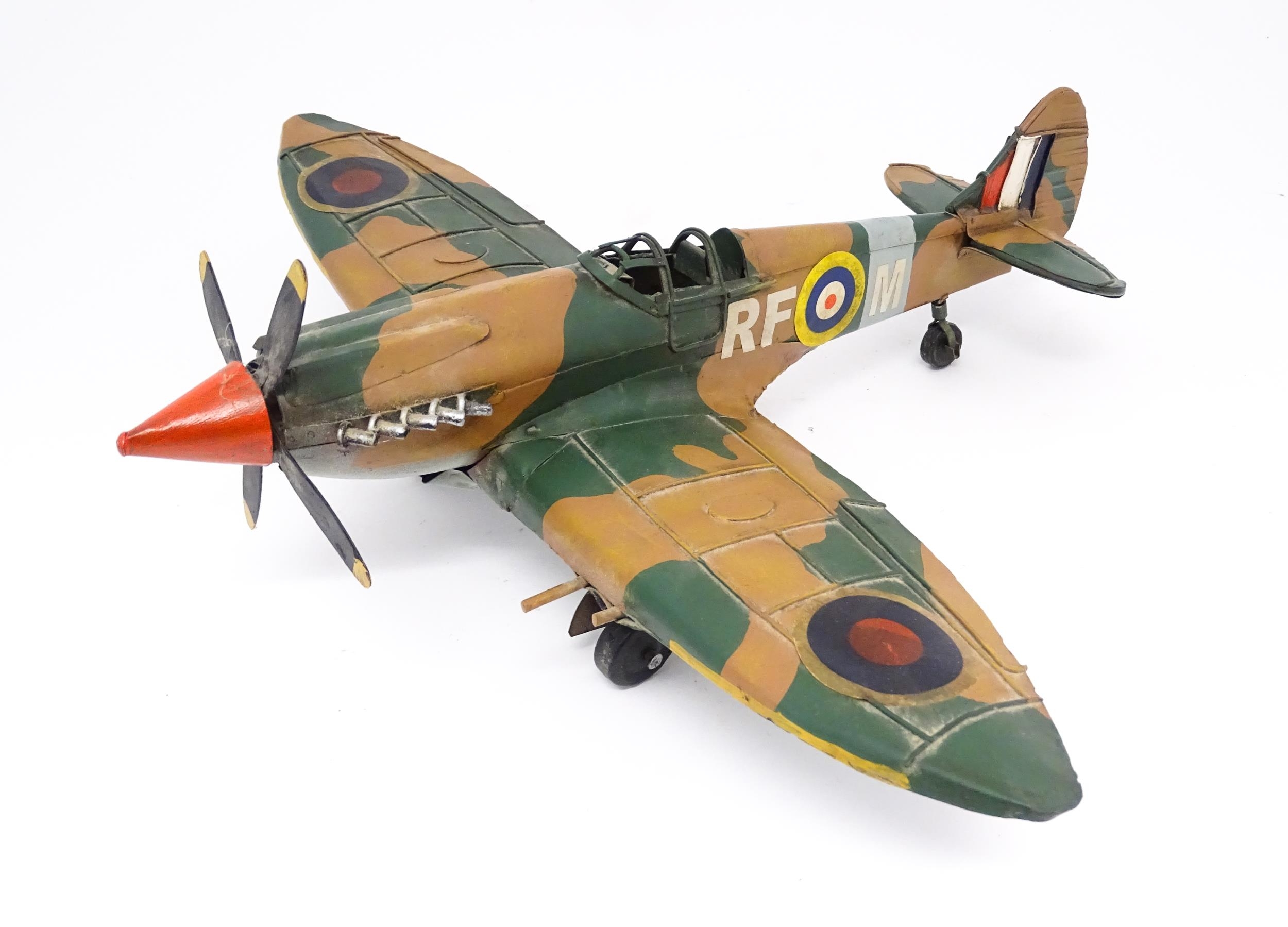 A 20thC scratch built tin plate scale model of a spitfire. Approx. 18" wide Please Note - we do - Image 4 of 10