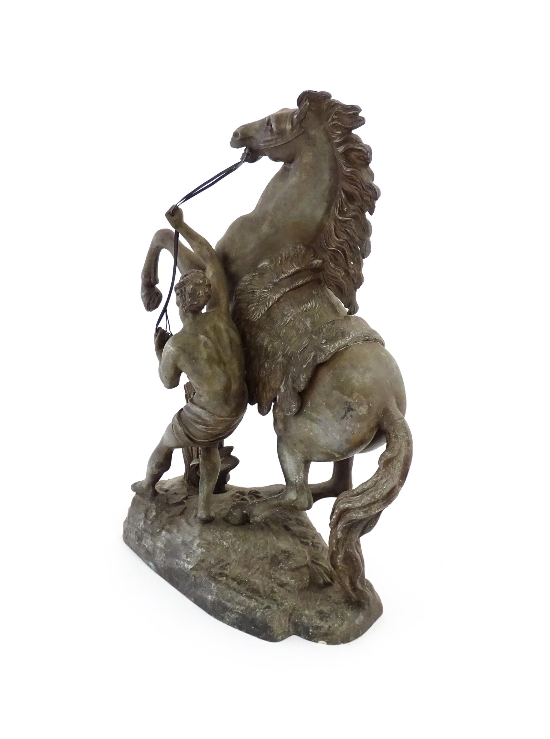 A 20thC cast Marly Horse modelled as a rearing horse with male attendant, after Guillaume Coustou I. - Image 6 of 8