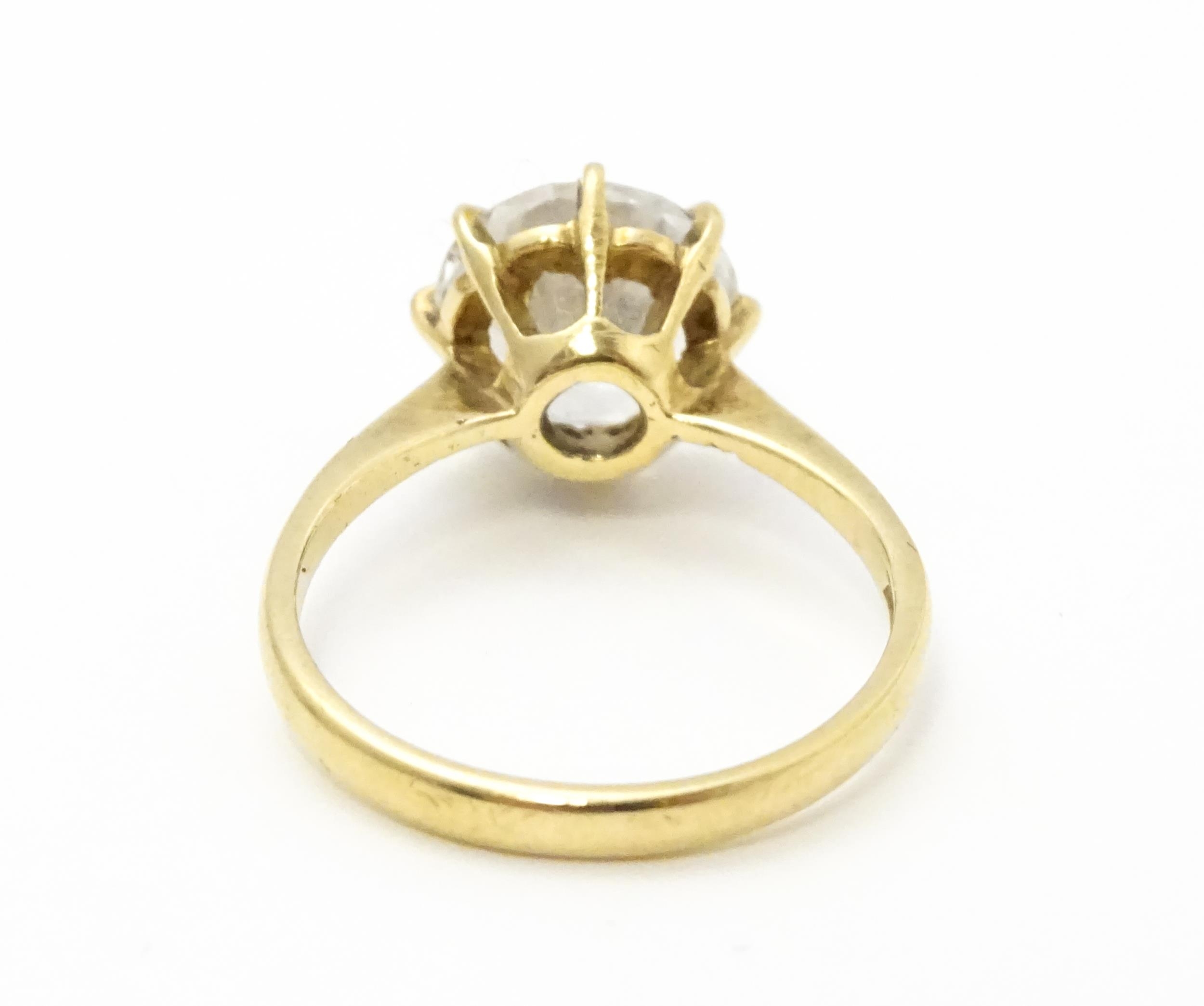 A 9ct gold ring set with a white stone solitaire. Ring size approx. O Please Note - we do not make - Image 5 of 7