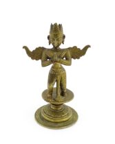 An Indonesian cast bronze model of Garuda on a circular pedestal base. Approx. 7 1/4" high Please