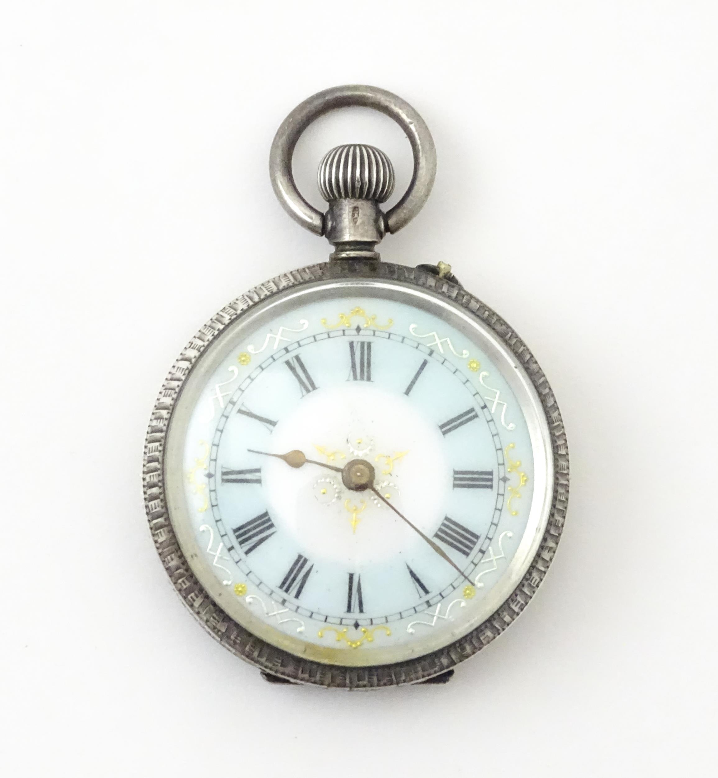 A Swiss silver cased pocket / fob watch with enamel detail and Roman Numerals. Approx 1 /4" wide - Image 3 of 11