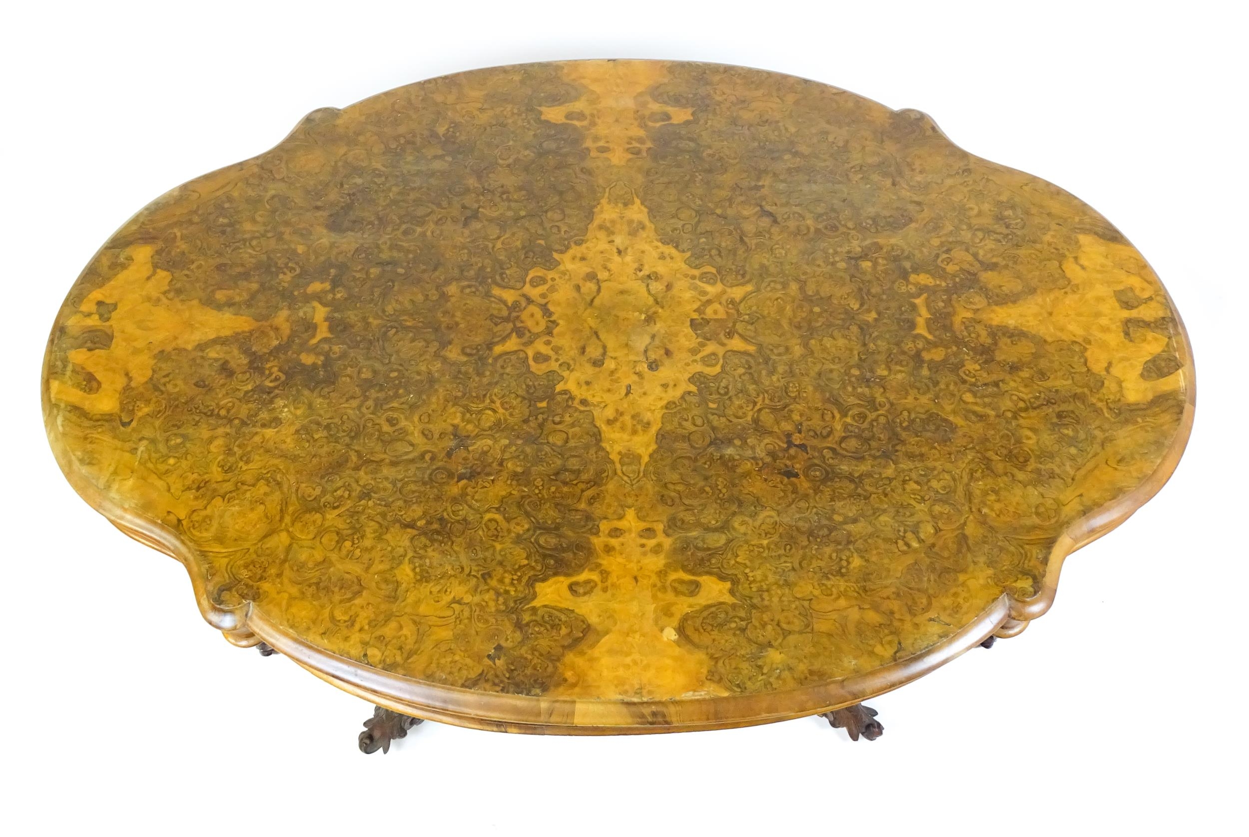 A 19thC burr walnut centre table with a moulded top above four acanthus carved supports, a large - Image 7 of 16