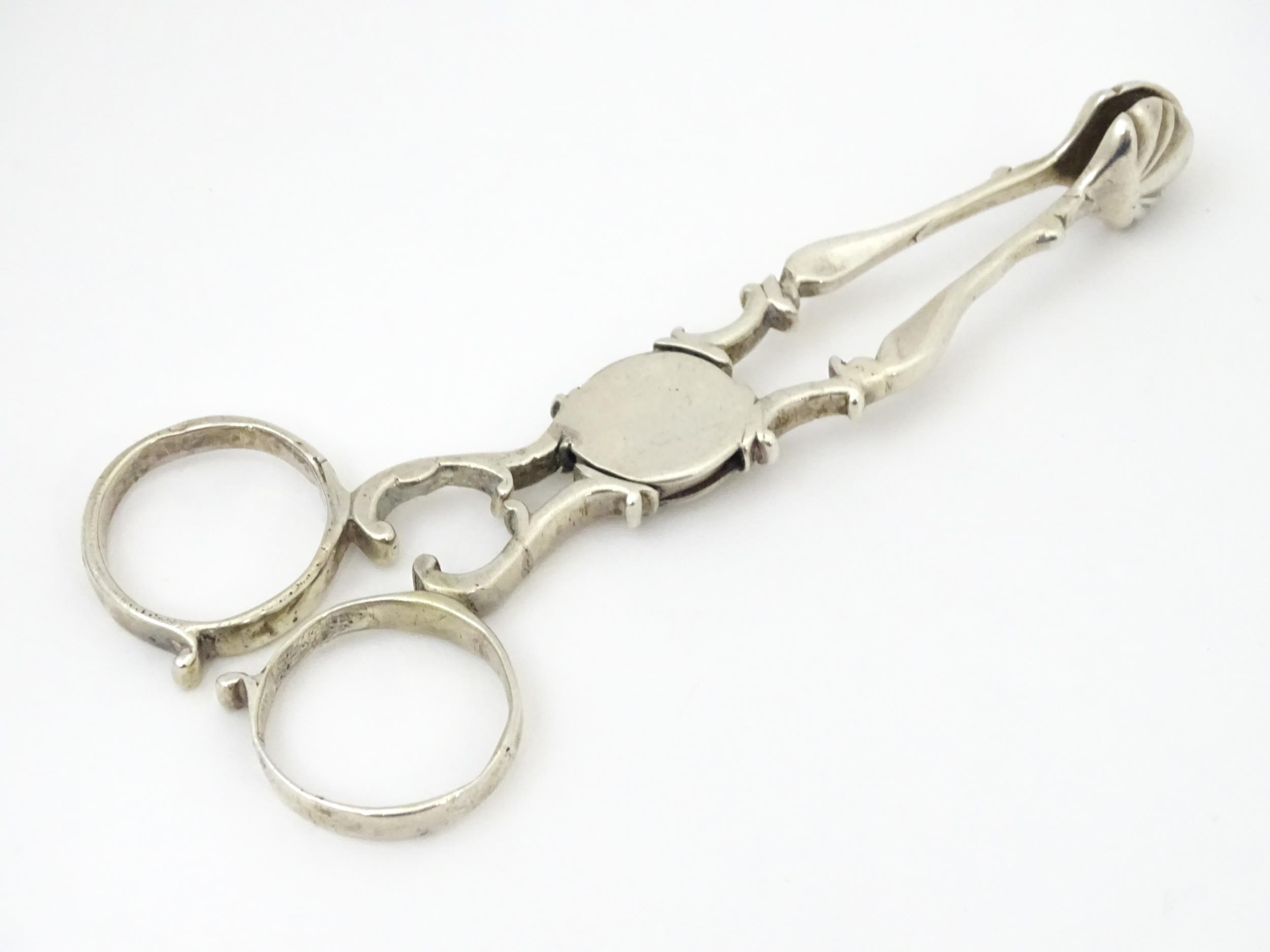 18thC silver sugar nips with shell formed grips. Appprox 4 1/2" long Please Note - we do not make