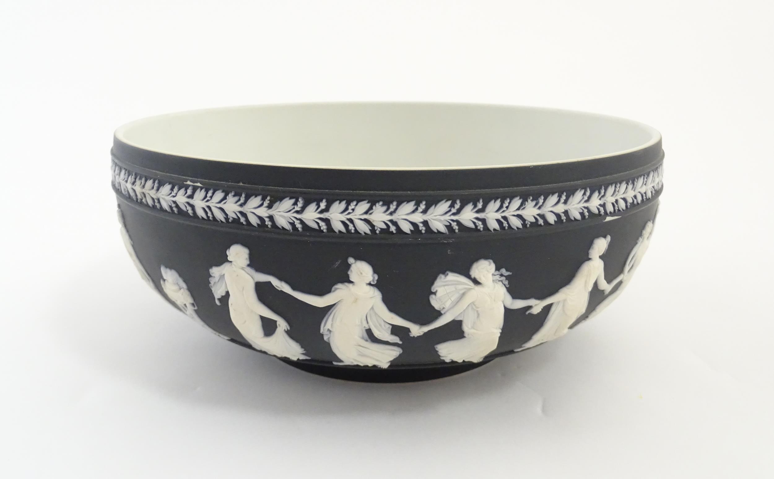 A Wedgwood black Jasperware bowl decorated with Classical maidens / Dancing Hours. Marked under. - Image 5 of 9