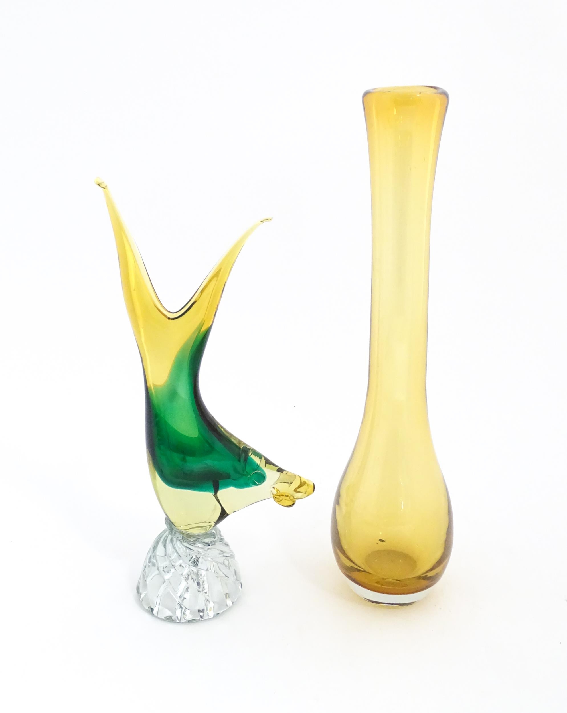 A Murano style glass vase modelled as a fish. Together with a studio glass vase of elongated form.