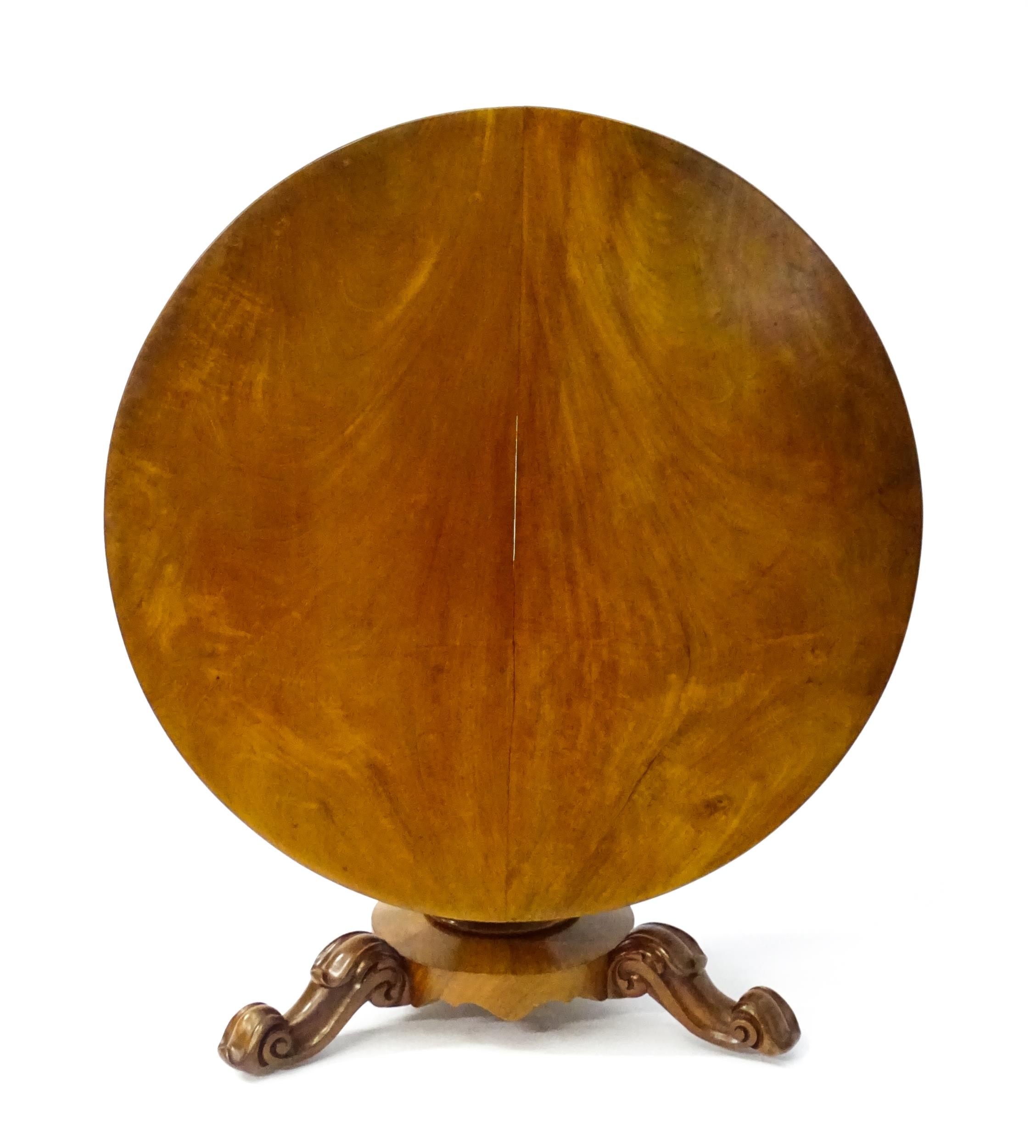 A 19thC mahogany tilt top breakfast table with a carved frieze above a turned and carved pedestal - Image 3 of 11