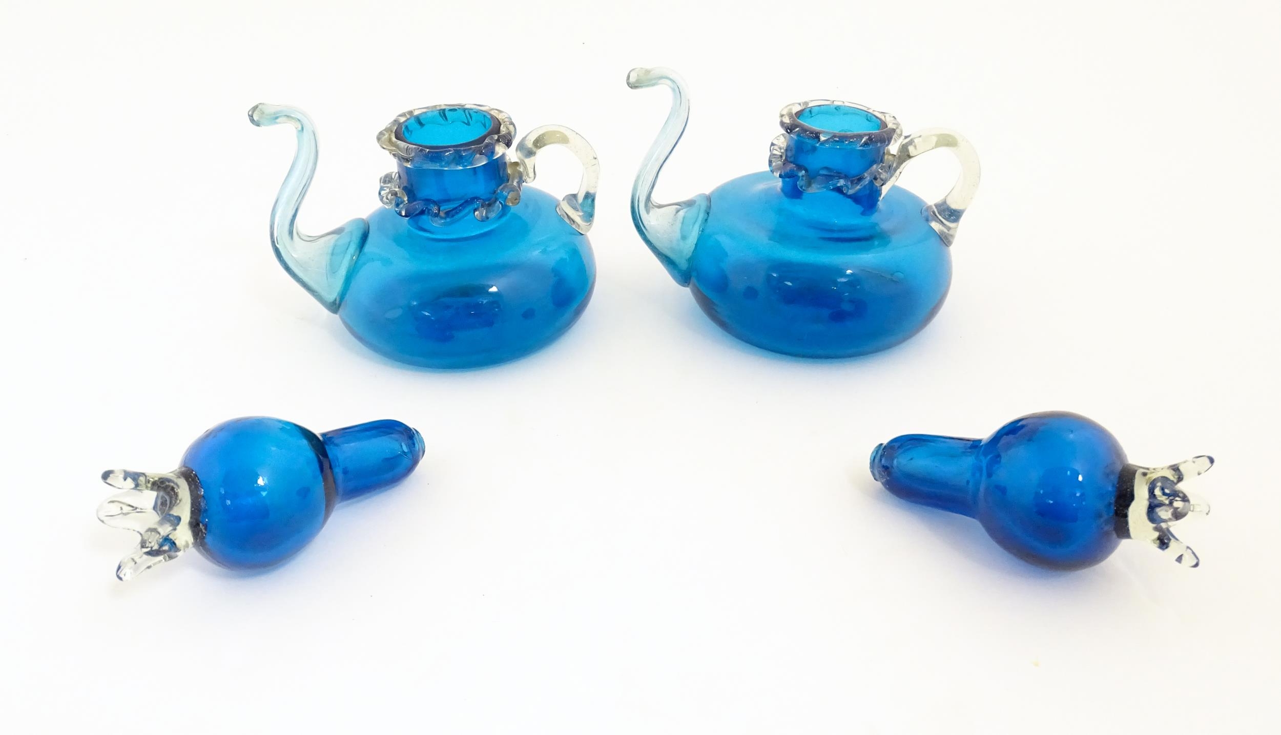 An unusual pair of turquoise glass oil / vinegar bottles of teapot form, the lids surmounted by - Image 4 of 11