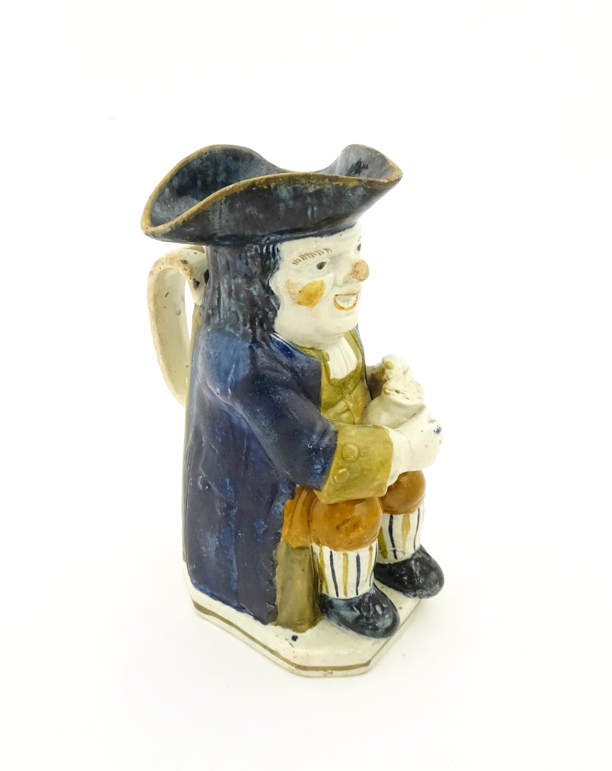 A 19thC Staffordshire pottery character Toby jug decorated in Pratt colours. Approx. 9 1/4" high - Image 4 of 6