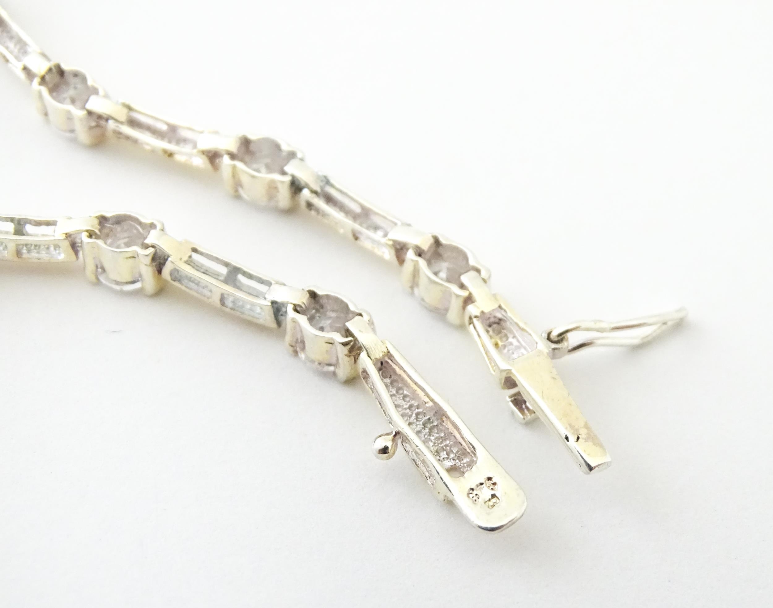 A .925 Silver bracelet set with cubic zirconia. Approx 7 1/2" long Please Note - we do not make - Image 9 of 9