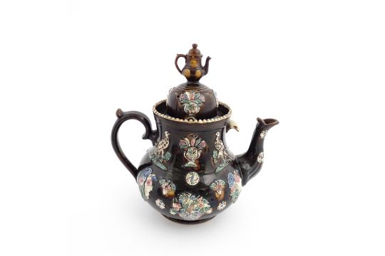 A large Victorian Measham bargeware teapot, the lid with teapot finial, the body decorated with - Image 1 of 9