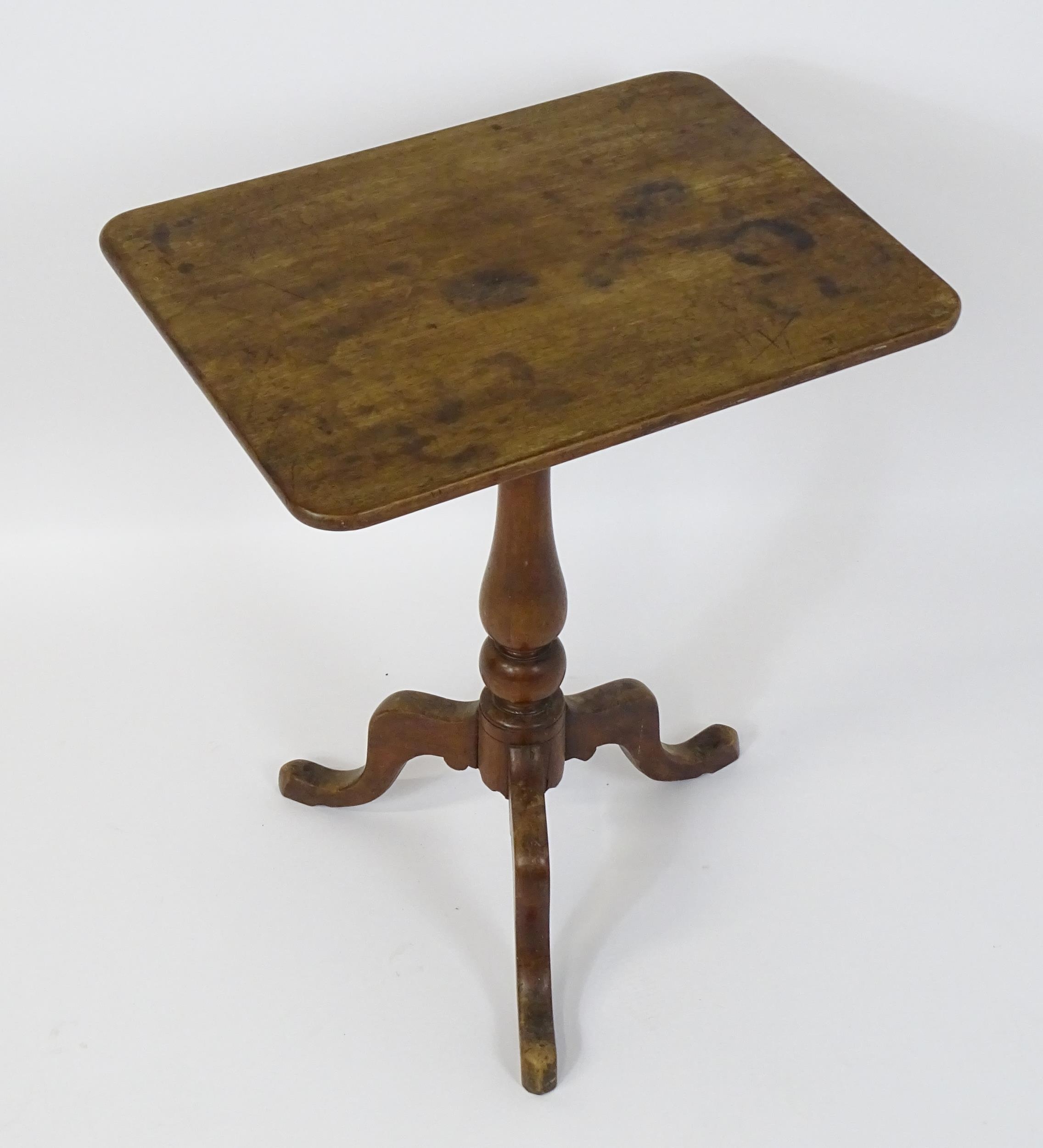 A Victorian mahogany tripod table with a tilt top raised on a turned pedestal and three cabriole - Image 3 of 4