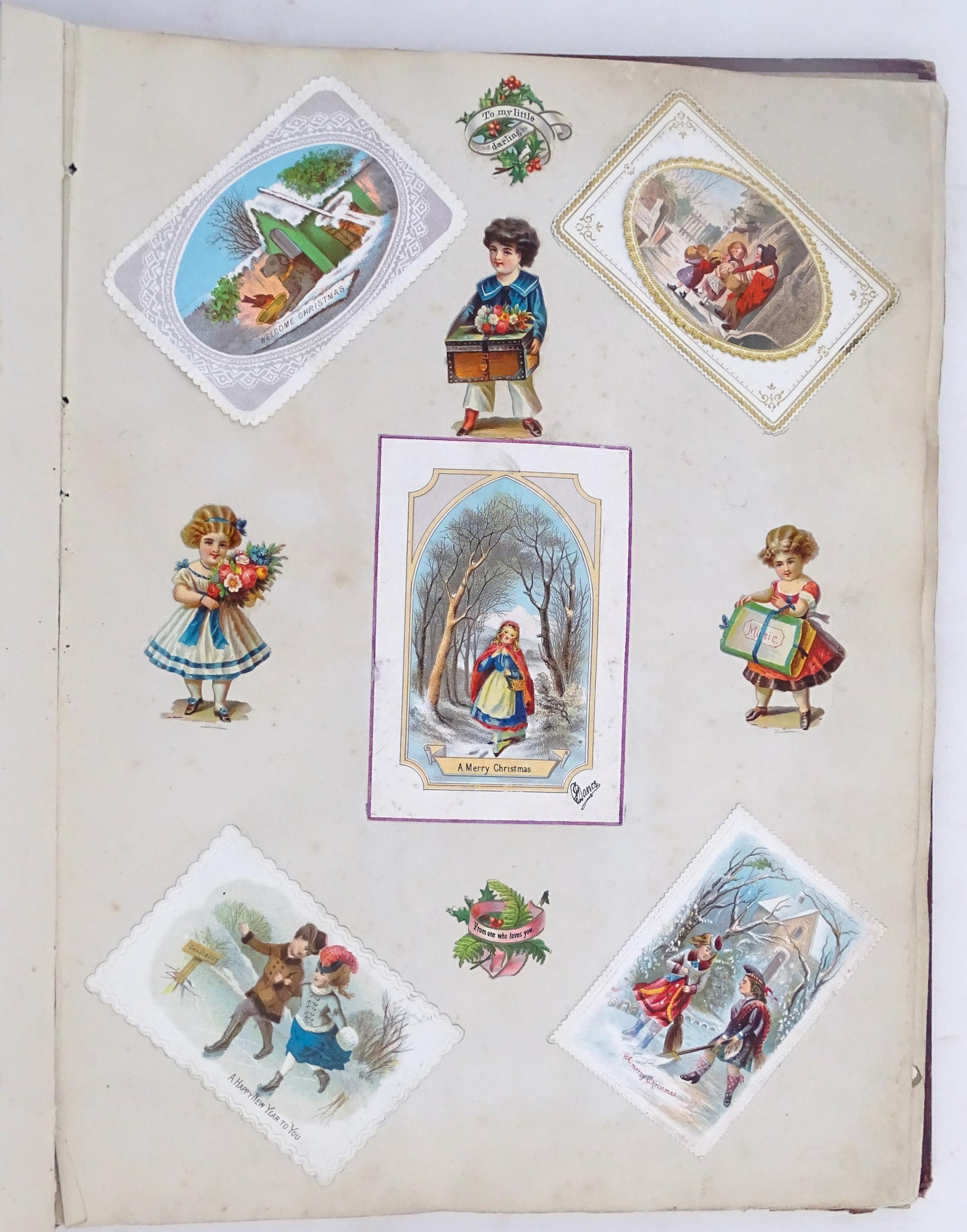 A Victorian scrapbook to include Christmas cards, greetings cards, scraps depicting cats, dogs, - Image 16 of 21