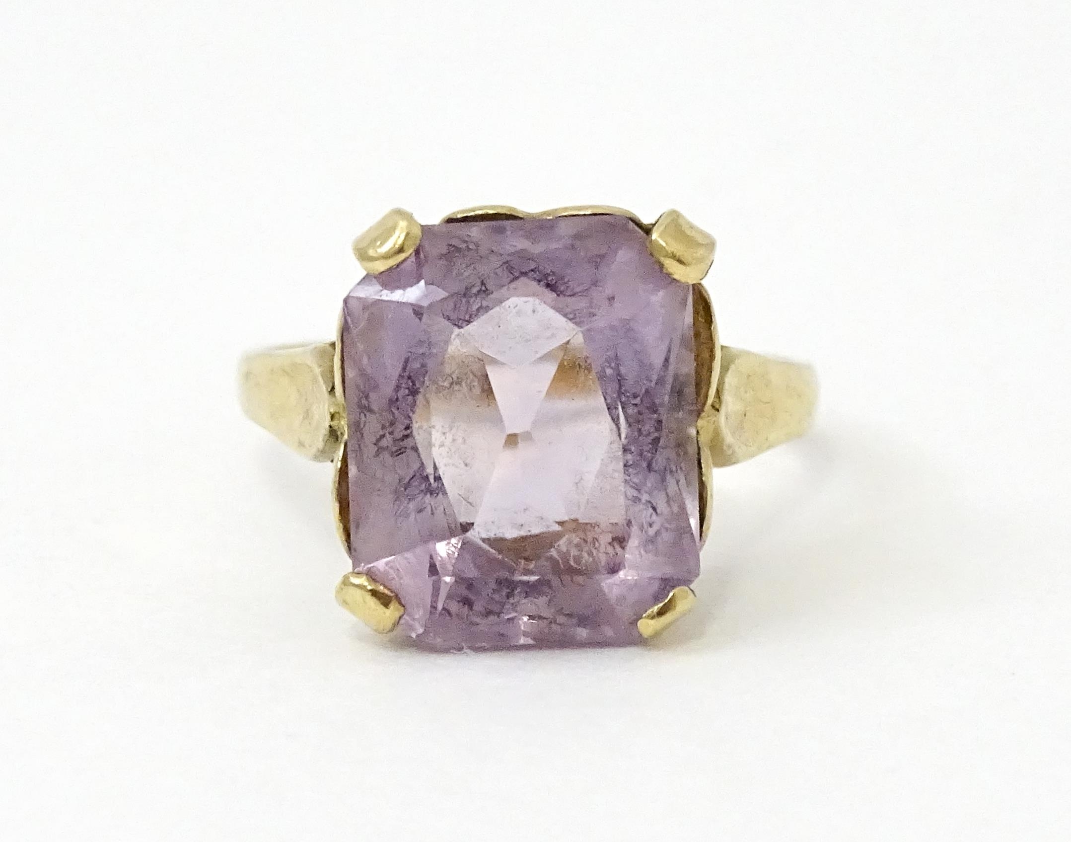 A 9ct gold ring set with amethyst. Ring size approx. K Please Note - we do not make reference to the - Image 2 of 7