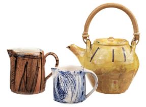 Garland (David, 1941 -). A terracotta earthenware teapot with cane handle, 2009