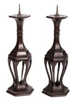 Candle Holders. A pair of bronze hexagonal candle holders, 17th/18th Century