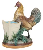 Majolica. A Victorian Minton majolica spill vase modelled as a hen by John Henk