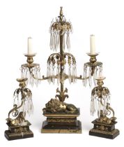 Candelabras. A set of three gilt metal and bronze chandelier candelabras