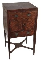 Campaign Furniture. A mahogany drinks cabinet, mid 19th century