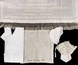 Infants' Items. An embroidery commemorating births in the Cuddon-Fletcher family, 1870s, & clothing