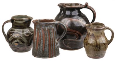 Studio Pottery. A collection of jugs, including a stoneware jug by Mike Dodd (1943 -)