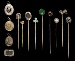 Tie Pins. A collection of tie pins and mourning jewellery