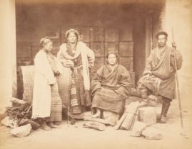 India. A group portrait of two Bhootea men and two women from the Himalayan region
