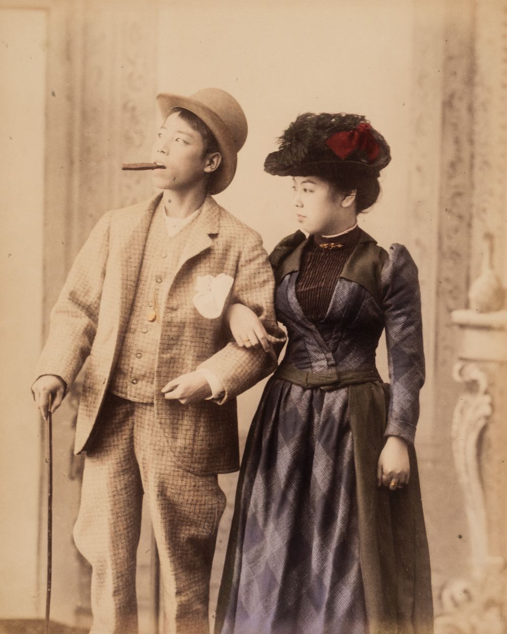 Japan. A young Japanese couple in western clothes, c. 1880s