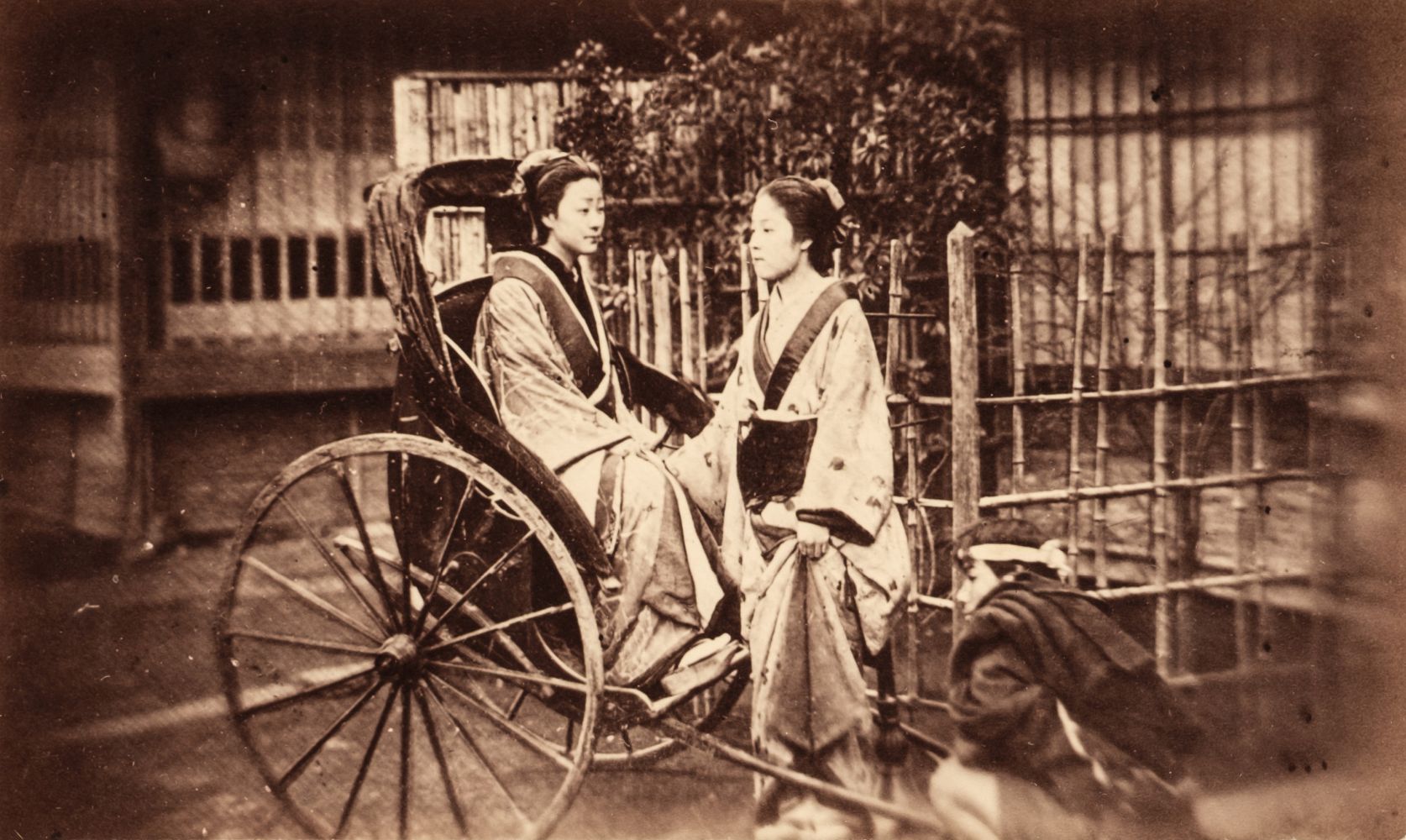 Japan. A group of 8 mostly hand coloured albumen prints of Japanese people, c. 1870