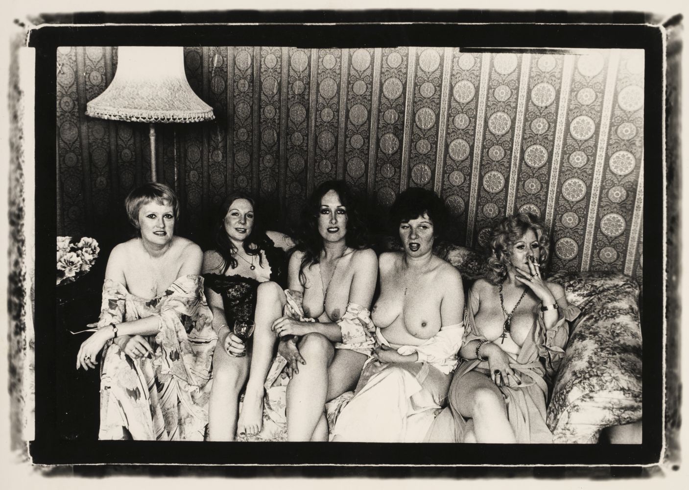 Clark (Nobby, active 1968-present). A group of 9 candid photographs of semi-dressed women
