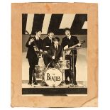 The Beatles. Signed Photograph, c. 1963/64, mounted gelatin silver print photograph, 1963