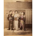 Japan. Three young Japanese women in traditional dress