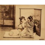 Japan. Two seated young women, c. 1880