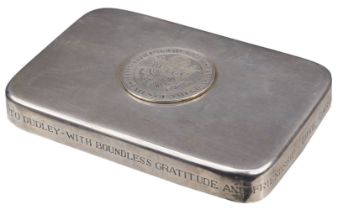Tiffany & Co. A silver presentation paperweight
