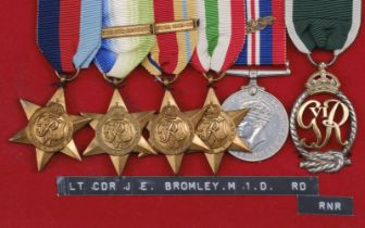 Naval Medals. A group of six medals attributed to Lieutenant Commander J.E. Bromley, Merchant Navy