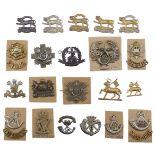 Cap Badges. A collection of regimental cap badges