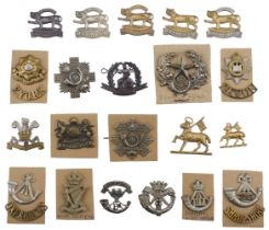 Cap Badges. A collection of regimental cap badges