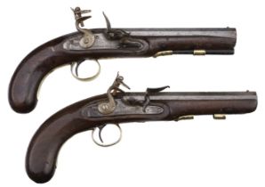 Pistols. A pair of flintlock pistols by William Parker