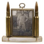 Trench Art. A WWII brass airman's tribute frame