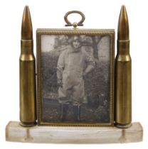 Trench Art. A WWII brass airman's tribute frame