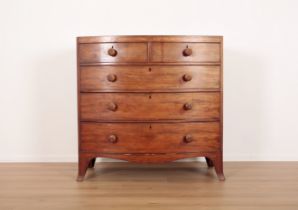 A REGENCY MAHOGANY BOW FRONT CHEST OF DRAWERS
