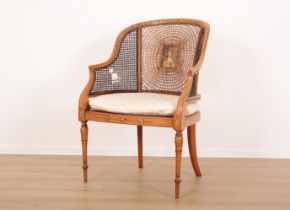 AN EDWARDIAN SATINWOOD AND POLYCHROME ARMCHAIR