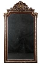 A CONTEMPORARY STAINED WOOD AND PARCEL GILT PIER MIRROR