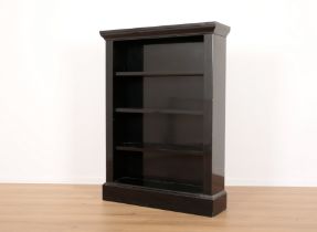 A CONTEMPORARY BLACK LACQUERED BOOKCASE