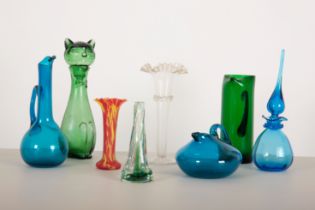 A GREEN MOULDED GLASS 'CAT EWER'