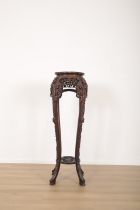 A CHINESE EXPORT HARDWOOD CARVED JARDINIERE STAND
