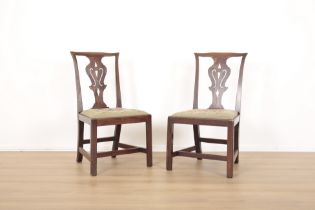 A PAIR OF MAHOGANY 'CHIPPENDALE' HALL CHAIRS